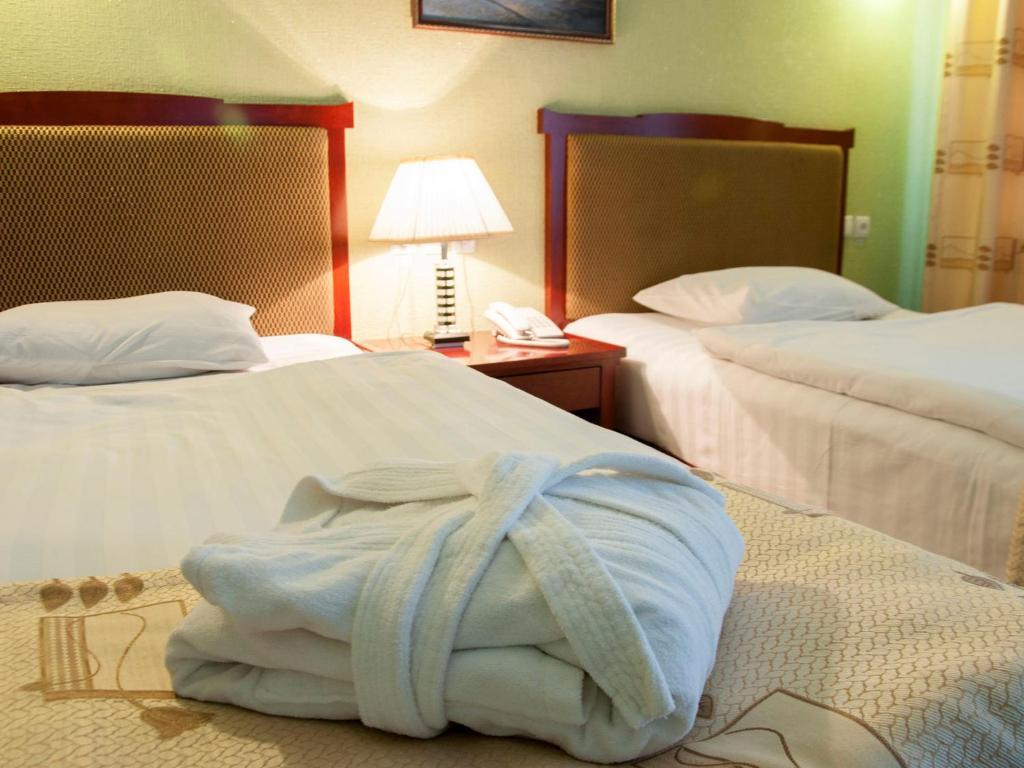 Golden Valley Hotel Taschkent Zimmer foto